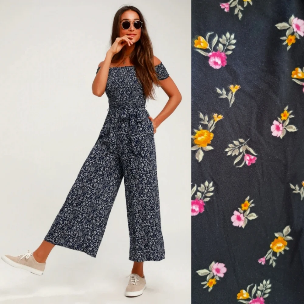 NWT PLUS SIZE OFF SHOULDER SMOCKED JUMPSUIT BY JUSTIFY